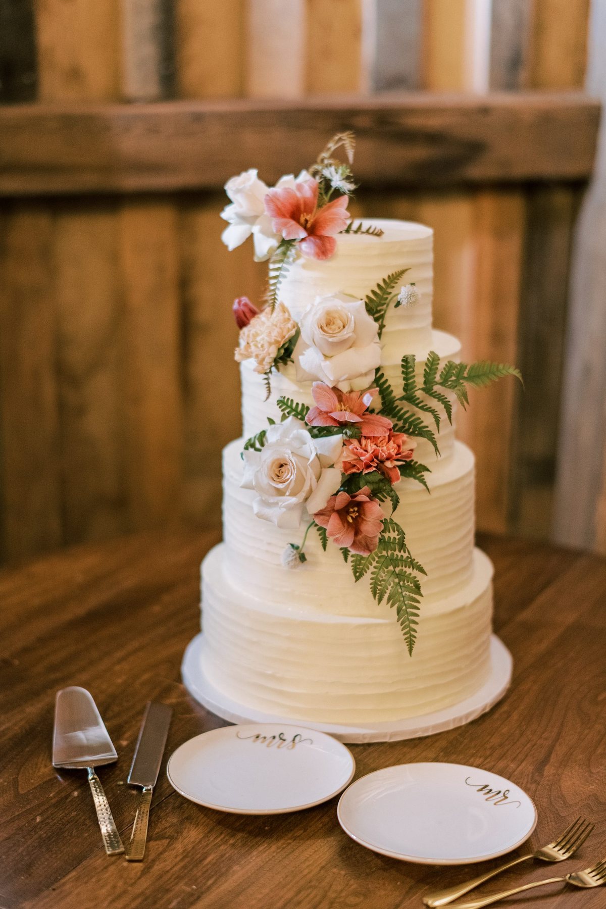 Mrs. Sugar Booger bespoke wedding cake with fresh florals